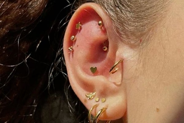 Triple helix piercing with minimalist studs