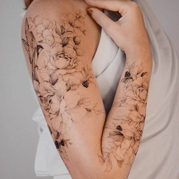 Ladies shoulder tattoo designs