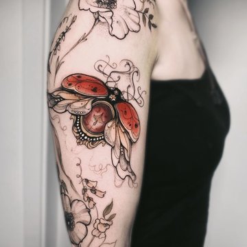 Ladies shoulder tattoo designs
