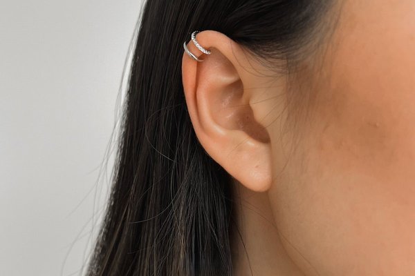Double helix piercing curated ear project example