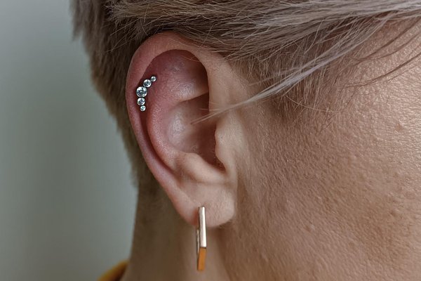 Ear cartilage piercing