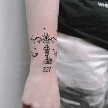 libra tattoo design