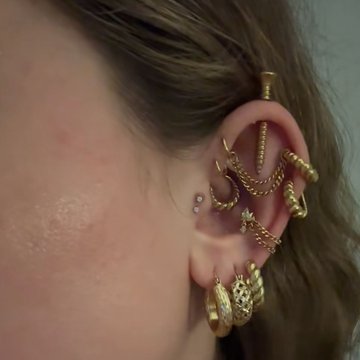 Horizontal and vertical helix piercings combined