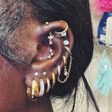 Vertical helix piercing with customized jewelry