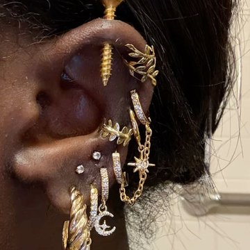 Vertical helix piercing with customized jewelry