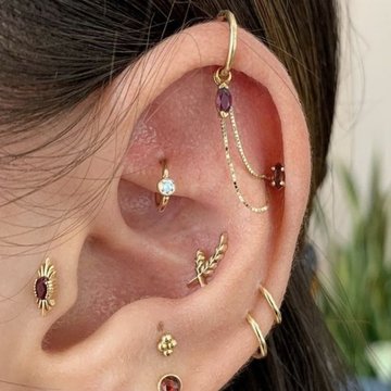 Vertical helix piercing with sparkling diamond stud