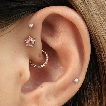 Double forward helix piercing with two crystal studs