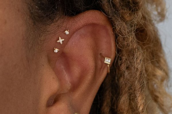 Triple forward helix piercing