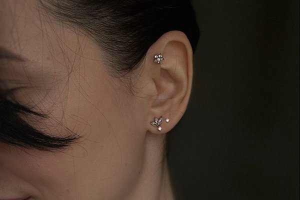 Woman with forward helix piercing