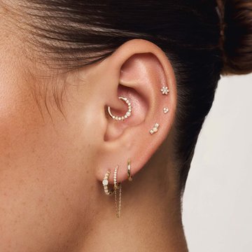 Pretty mid helix piercing with crystal studs