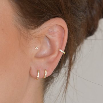 Tragus and mid helix piercing combination