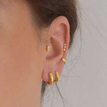 Pretty mid helix piercing with crystal studs
