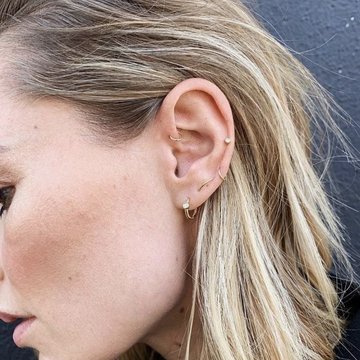 Minimalist mid helix piercing with silver hoops