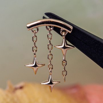 Hidden helix piercing with silver stud and gemstone
