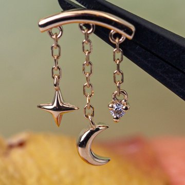 Stylish hidden helix piercing with rose gold jewelry