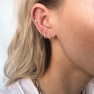 Pretty double helix piercing