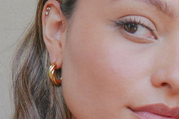 Pretty double helix piercing