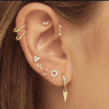 Double mid helix piercing with two gold hoops