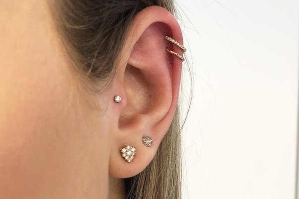 Double helix piercing curated ear project example