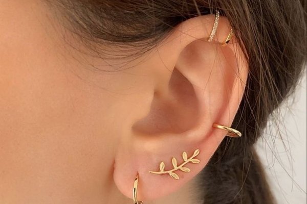 Double helix piercing curated ear project example