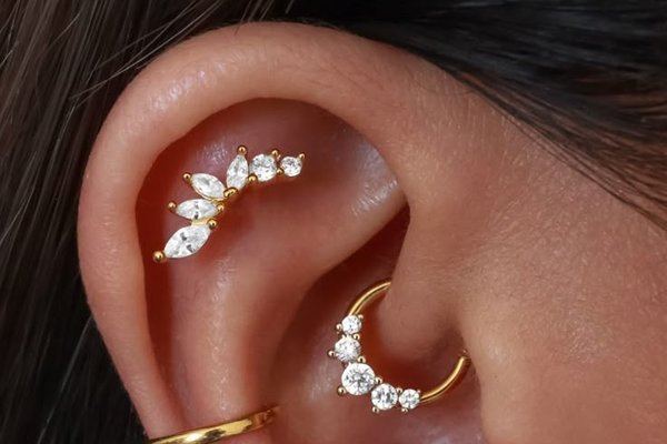 Stylish flat helix piercing with gemstone stud