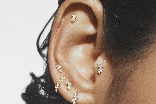 Flat back helix piercing close-up inside ear