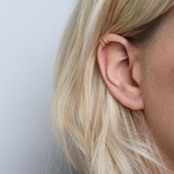 Double mid helix piercing with matching rings