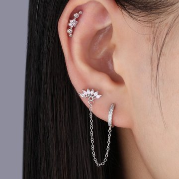 Artistic ear design highlighting double helix piercing