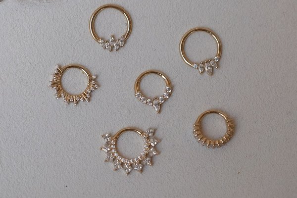 Conch and mid helix piercing jewelry ideas with crystals