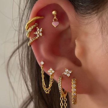 Triple helix piercing with hoop and stud mix