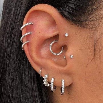 Triple helix piercing with small hoops