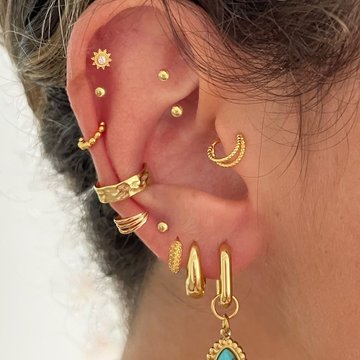 Triple helix piercing elegant ear styling photo